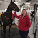 Shawna Ward with homebred two year old standardbred pacer, Big Dream Fella (Jimmy), at Woodbine Mohawk Park summer, 2022